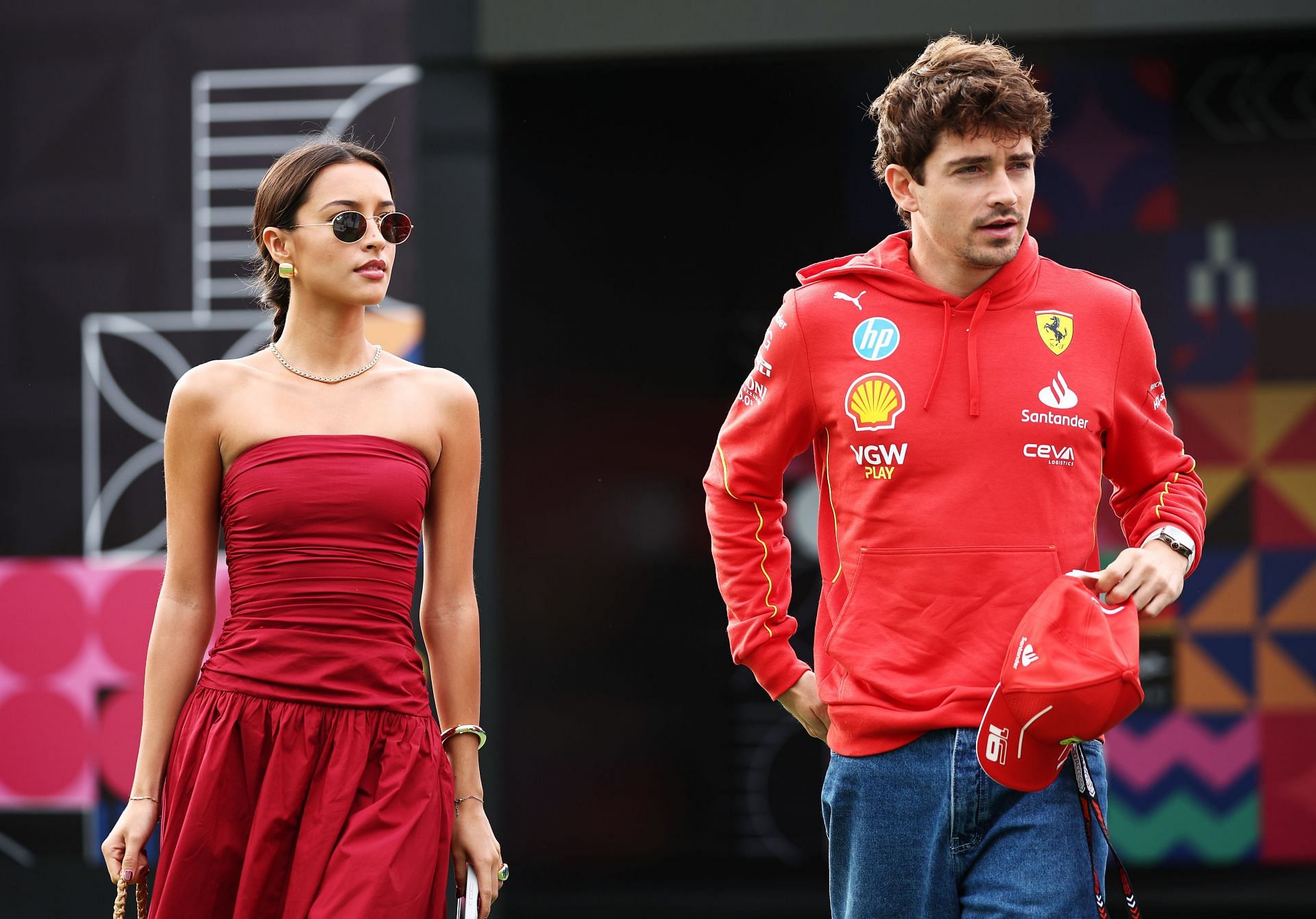 Charles Leclerc of Monaco and Ferrari and Alexandra Saint Mleux walk in the Paddock prior to the F1 Grand Prix of Mexico at Autodromo Hermanos Rodriguez on October 27, 2024 in Mexico City, Mexico - Source: Getty